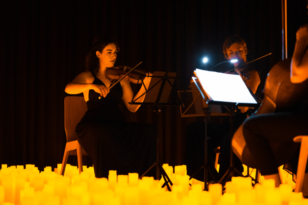 A string quartet performing at a Candlelight concert